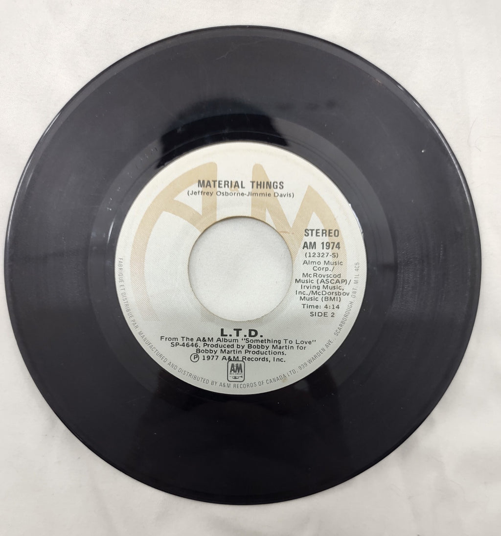 L.T.D. – (Every Time I Turn Around) Back In Love Again 7” A&M AM 1974