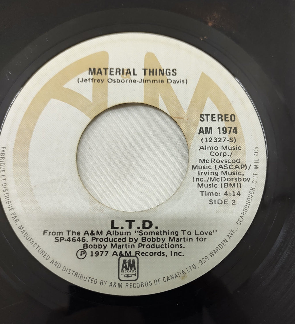 L.T.D. – (Every Time I Turn Around) Back In Love Again 7” A&M AM 1974