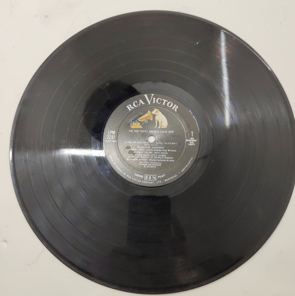 John Klein & Sid Ramin – The New Sound America Loves Best LPM-2237 LP