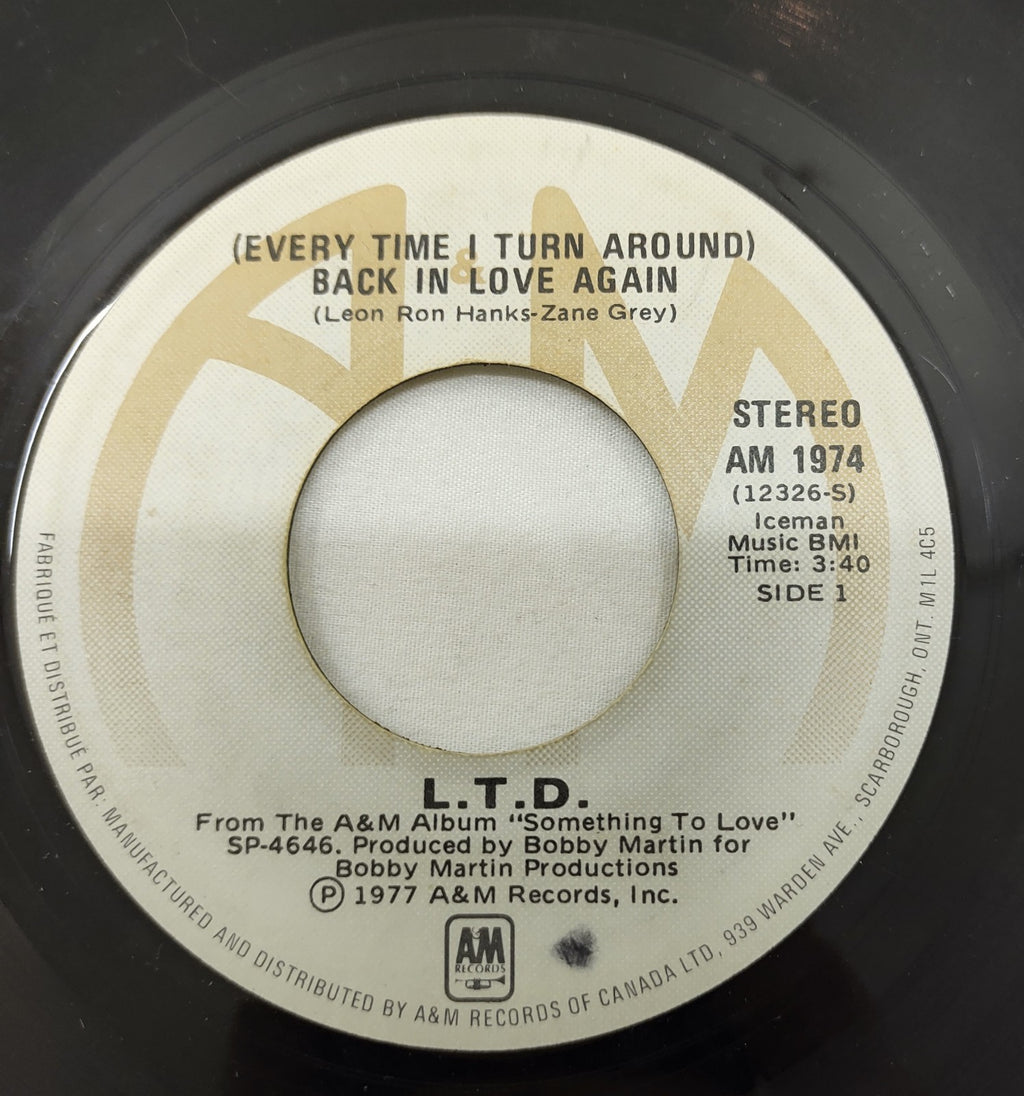 L.T.D. – (Every Time I Turn Around) Back In Love Again 7” A&M AM 1974