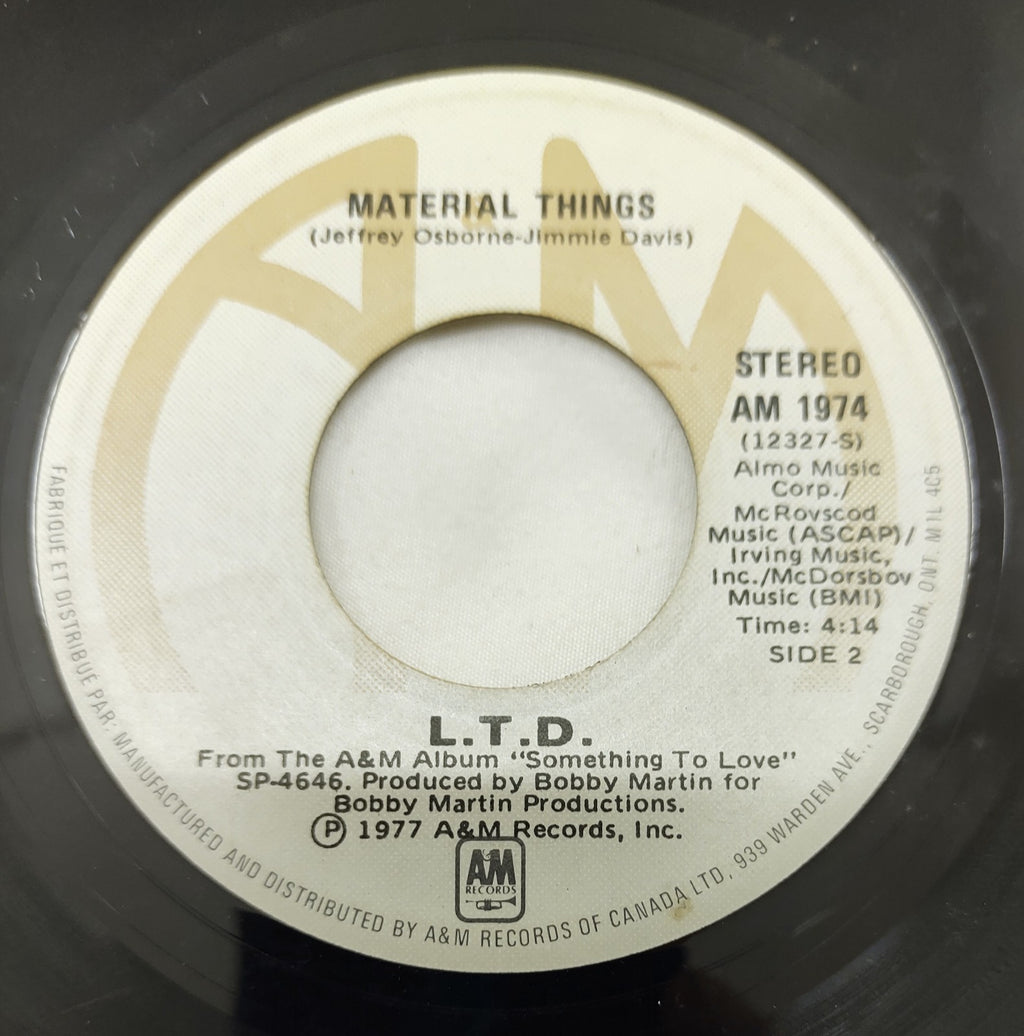L.T.D. – (Every Time I Turn Around) Back In Love Again 7” A&M AM 1974