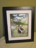 Framed Bulldog on Swing Art Print – Unique Animal Art for Dog Lovers